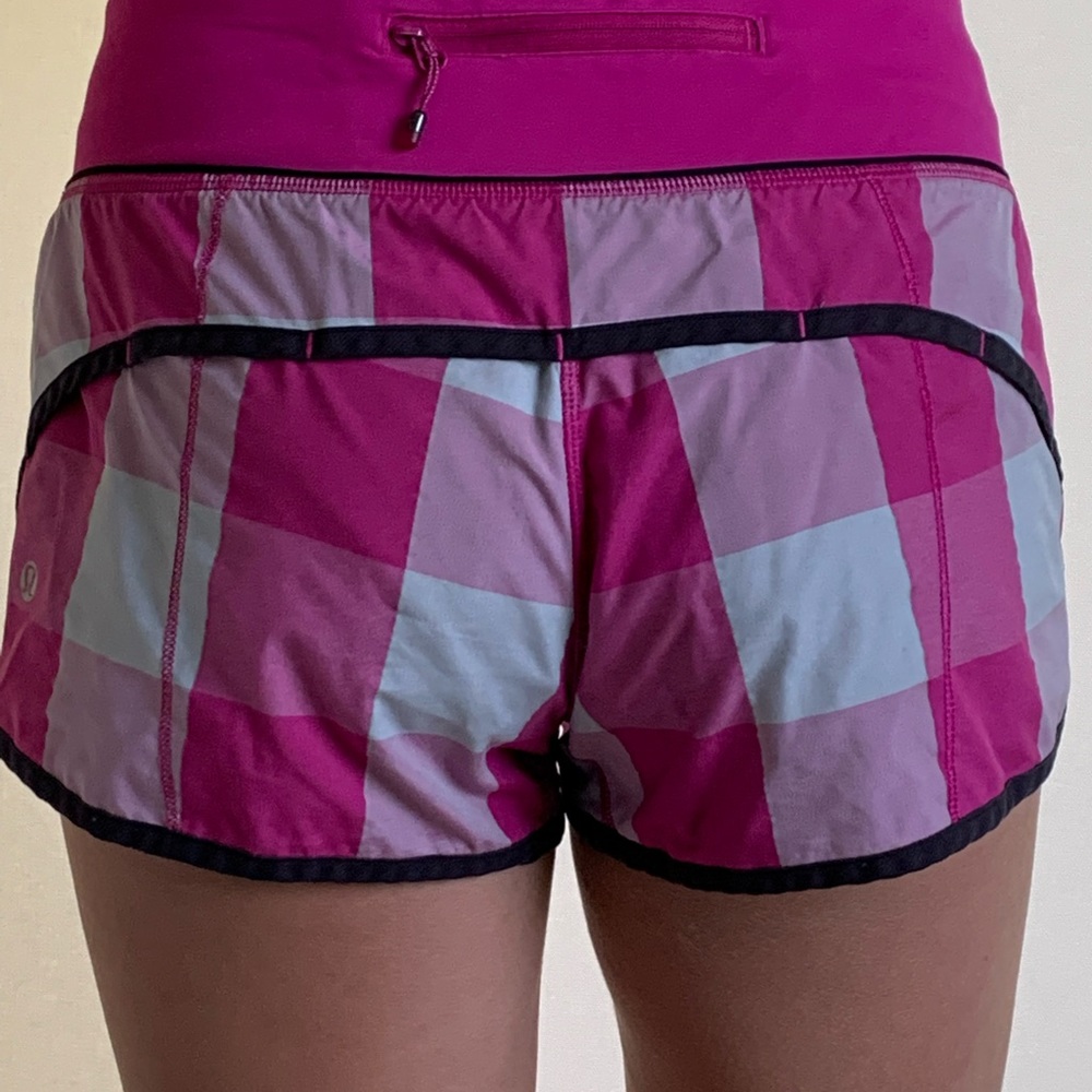 Adorable pink/black lululemon running shorts.